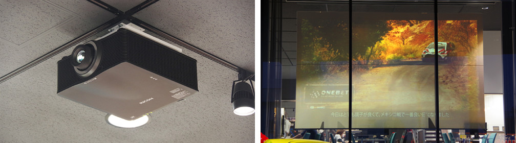画像：ハイエンドプロジェクターからの投影は店舗外からでも映像が鮮明に見え、店舗の認知度向上に貢献しています。