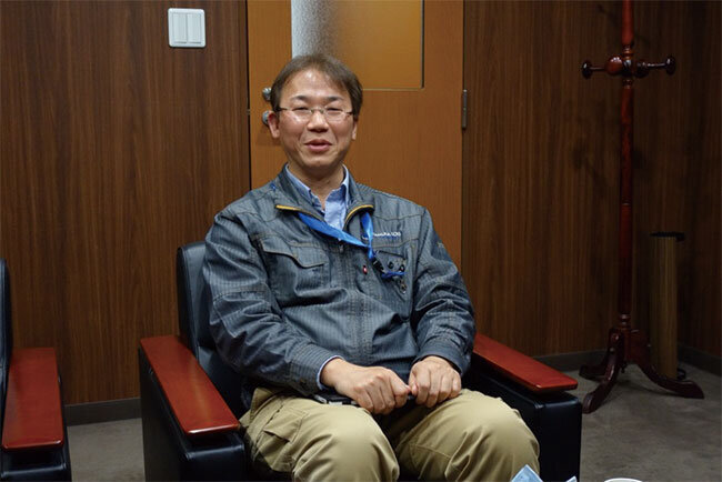 自ら各種システムの開発を手掛ける田村部長