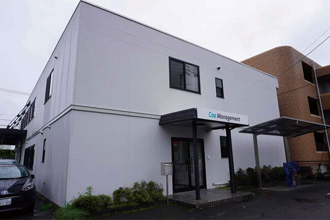 Coaマネジメントの本社の外観
