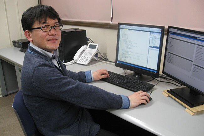 システムの運用を担当するシステムエンジニアの横山剛之氏