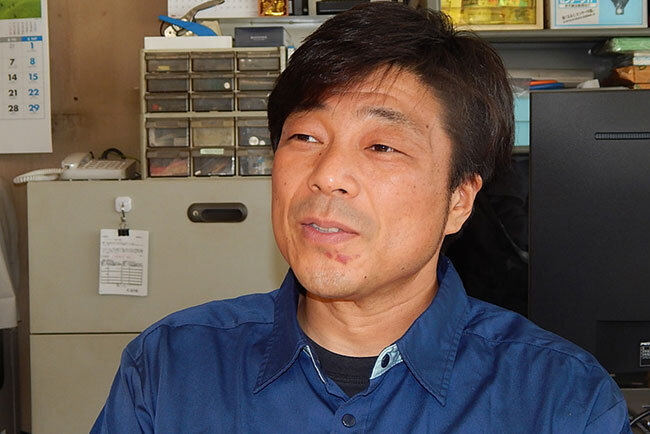 自社の事業内容について語る小島克宏代表取締役