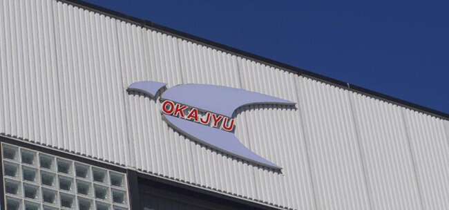 オカジュウのコーポレートマーク