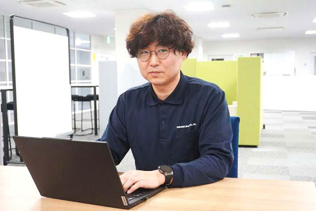 経営企画室ソリューショングループのチームリーダー高橋学さん