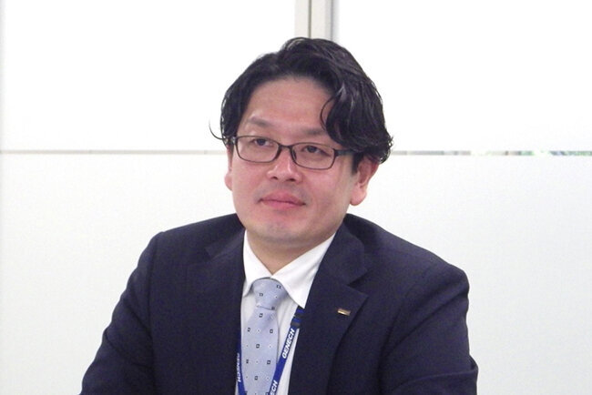 「1～2週間かかっていた契約書締結が最短2日で済むようになりました」と電子契約システムを評価する法務室 富永文男 氏