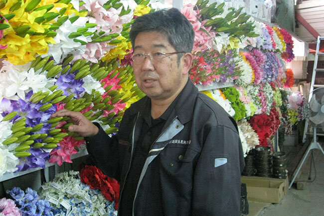 卸売市場で、これからのビジネスを熱く語る岡田明利社長