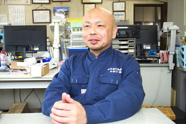インタビューに答える井野口誠社長