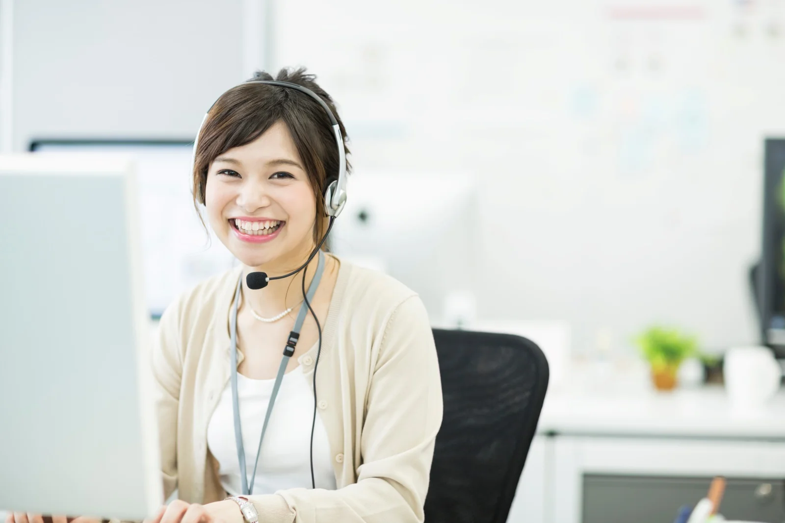 image of a woman working in a call center