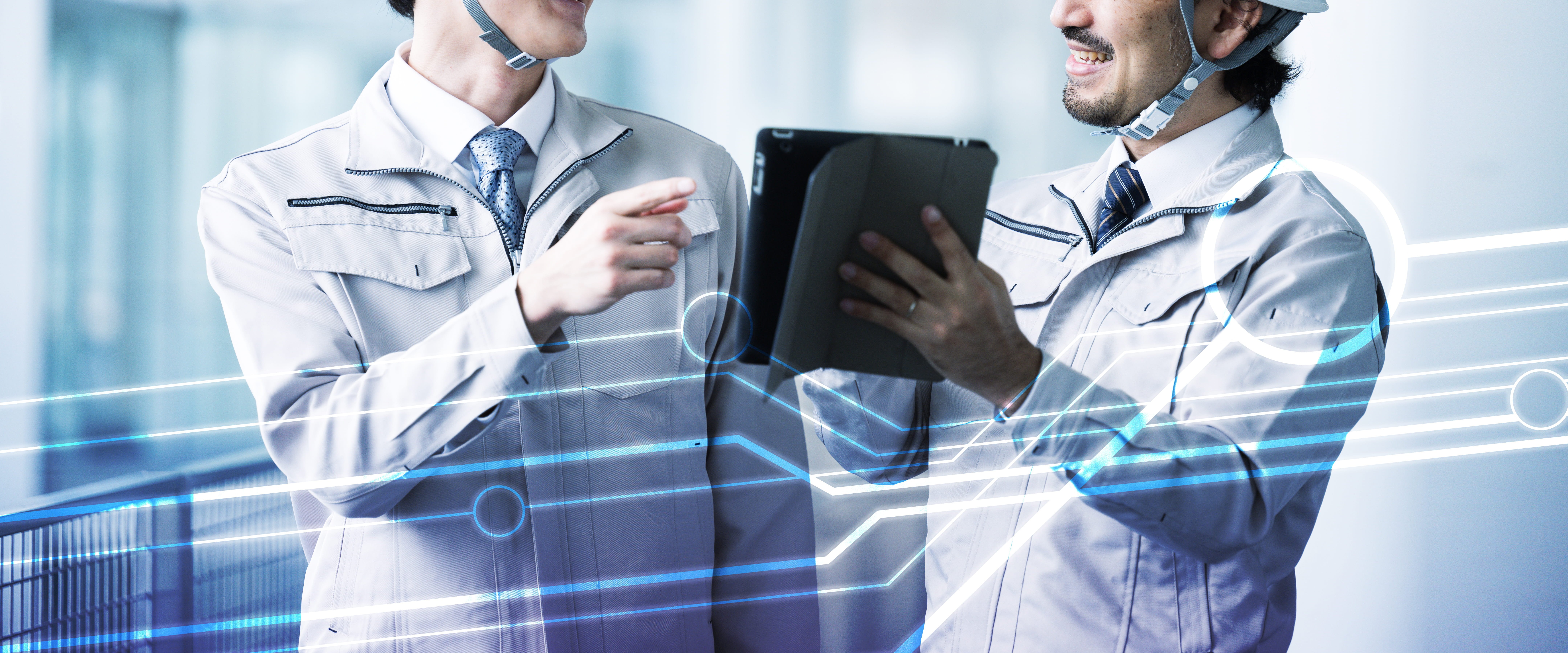 IT 作業着姿の男性2人